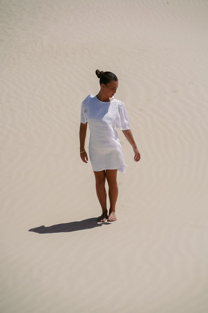 The Ease Florence Mini Dress - White linen mini dress with exaggerated sleeve and tie back