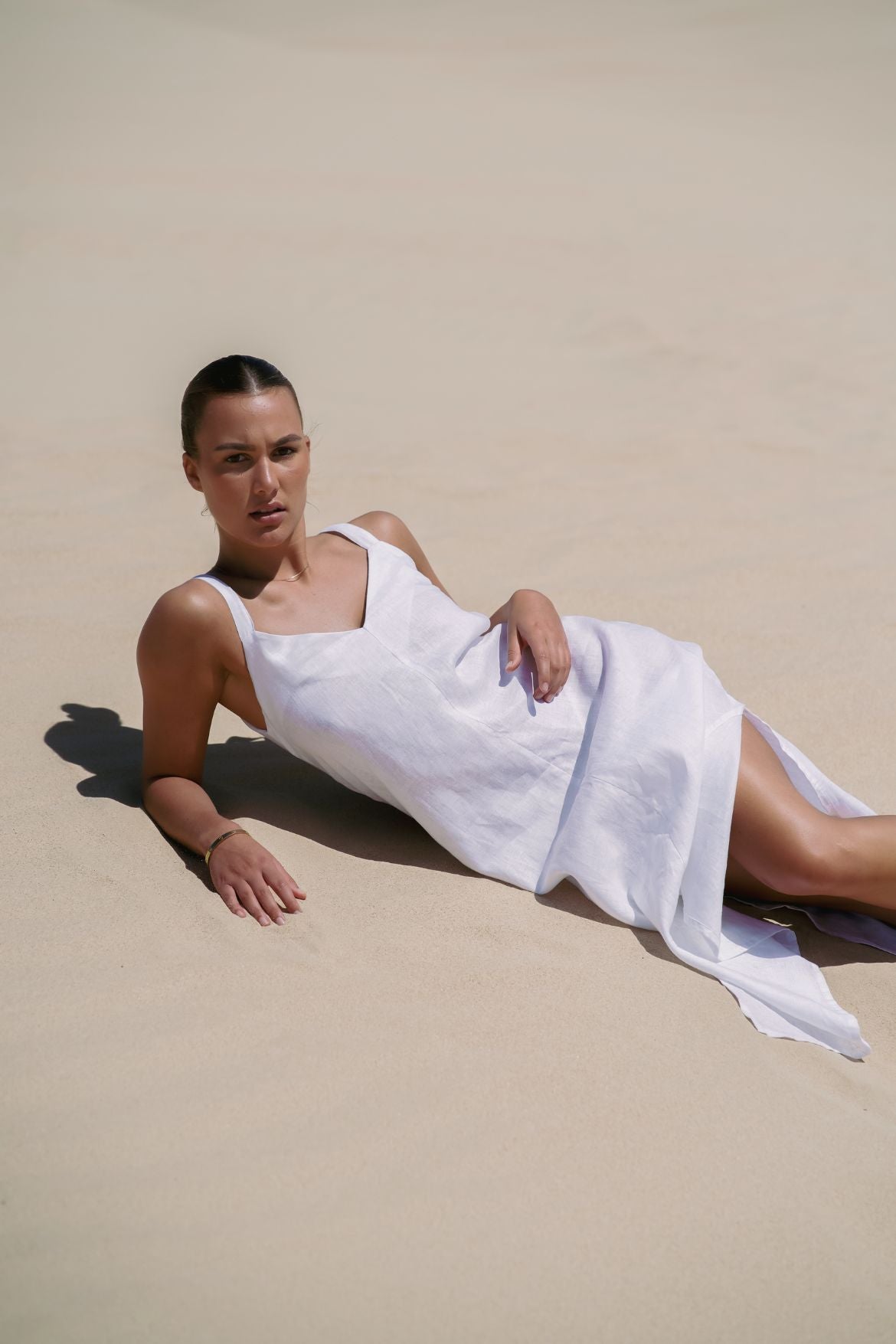 The Ease Imogen dress - Classic white linen shift dress with V neckline and leg splits