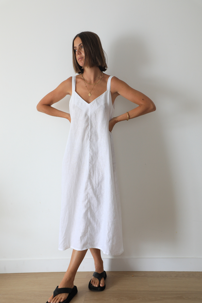 The Ease Imogen dress - Classic white linen shift dress with V neckline and leg splits