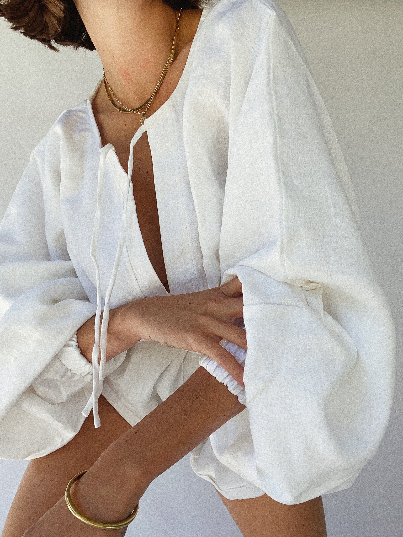 The Ease Label - Keros Romper - White Linen Romper with balloon sleeves