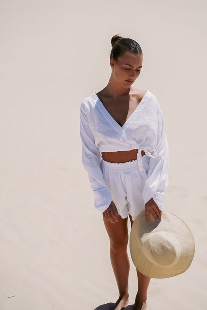 The Ease Sirena Shorts - White Linen flutter shorts with elastic waist